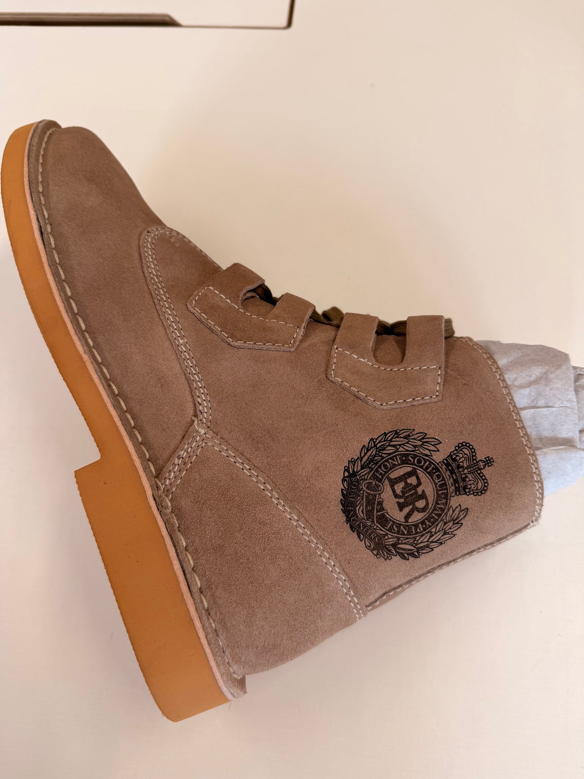 Royal Engineers cap badge laser engraved on a suede desert boot